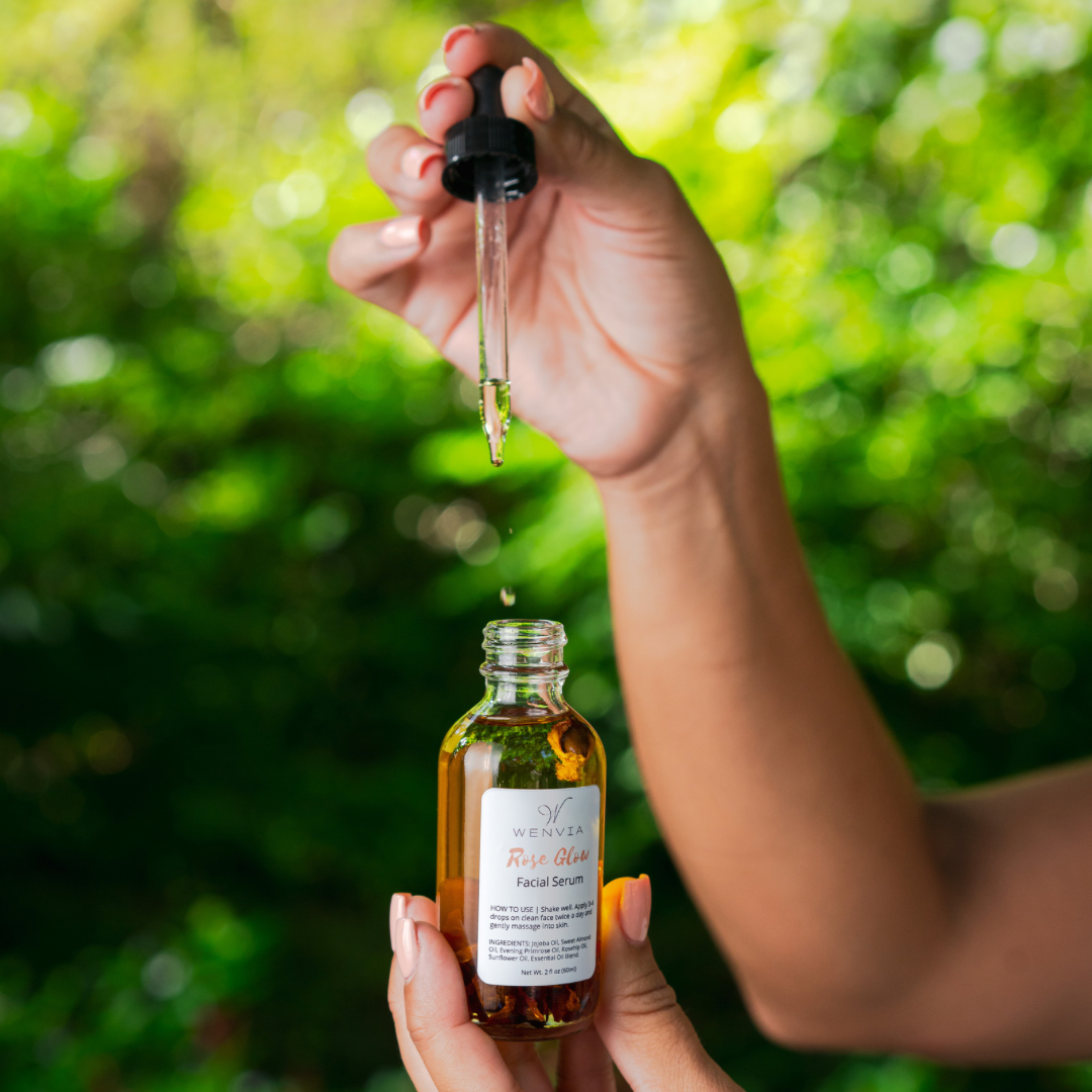 rose glow facial serum made by Wenvia shown in a dropper bottle.
