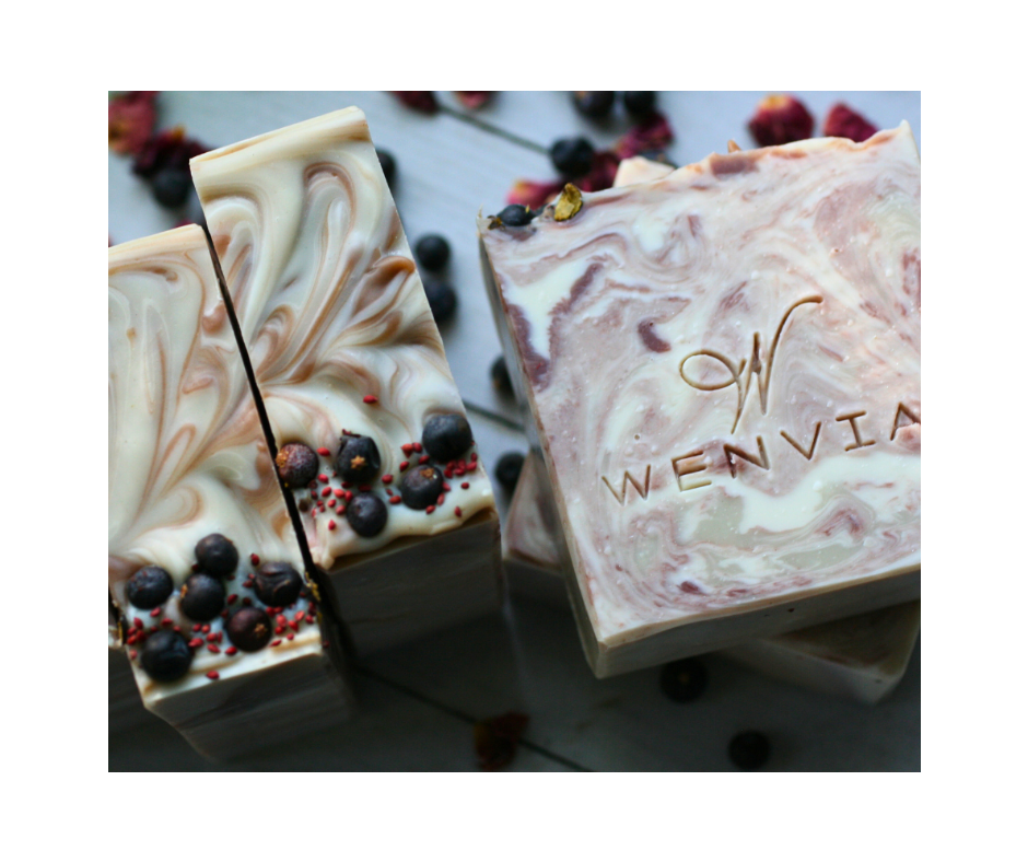 Marbled soap bars with visible 'Wenvia' branding on a light background