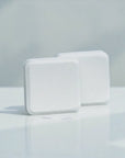 Two white shower steamers - self care, indulgent, luxury