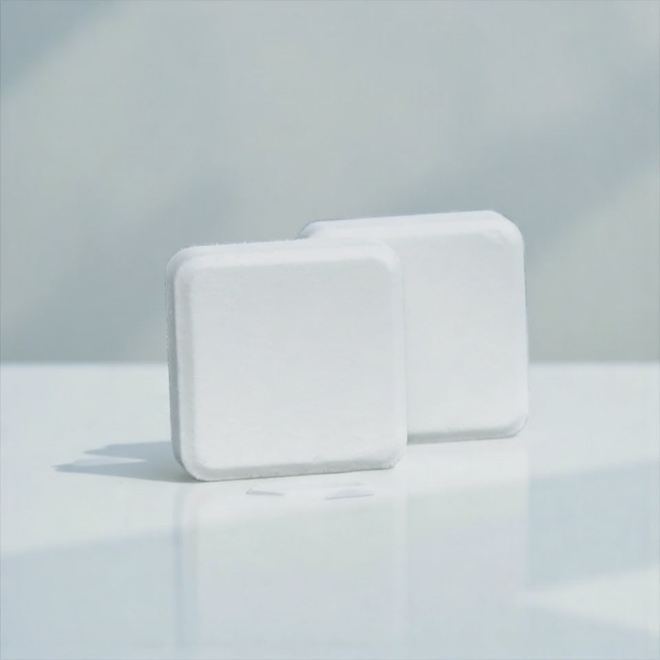 Two white shower steamers - self care, indulgent, luxury